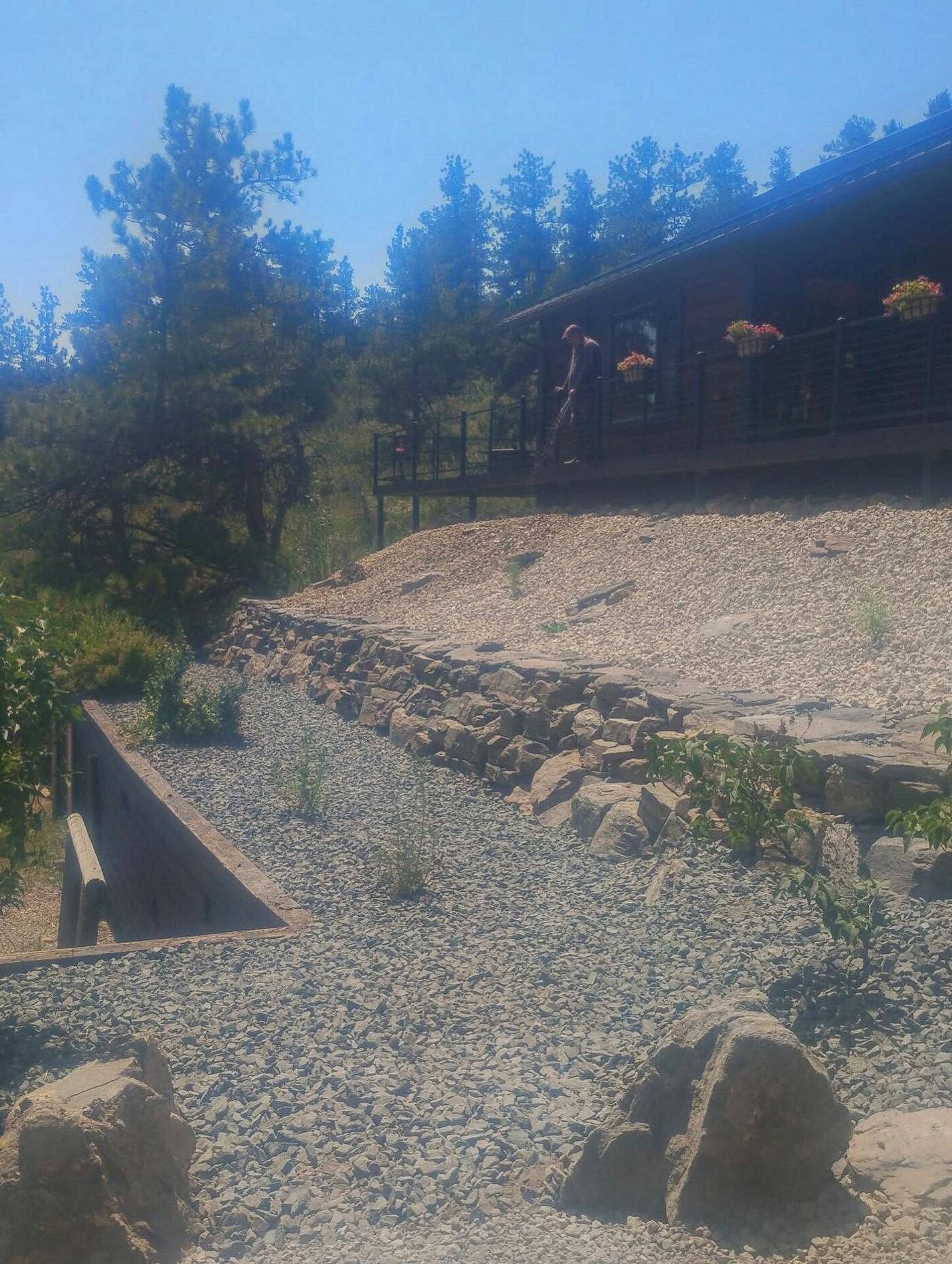Mountain property — rockwork & hillside drainage.